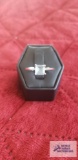 Silver colored ring with pale bluestone, marked 925.