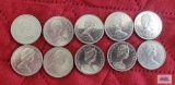 (7) 1969, 1972, 1975, and 1980 Canadian $1 coins