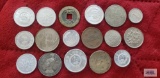 Coins from China, Japan, and Singapore.