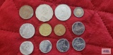 Coins from Australia and Brazil.