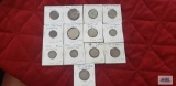 Variety of coins in coin holders