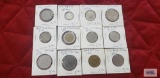 Italian coins in coin holders.