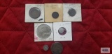 Foreign coins in coin holders