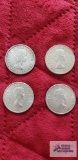 (1) 1960 and (3) 1964 Canadian 50 cent coins.