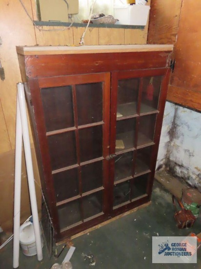 Vintage glass front bookcase, one door needs repaired and also glass