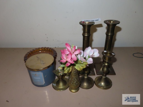 Brass candlestick holders, vase, White Barn candle, and amber colored ashtray