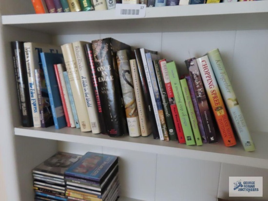 Assorted books including Snipers Eyes, Once An Eagle, Encyclopedia of Haunted Places, Chopping