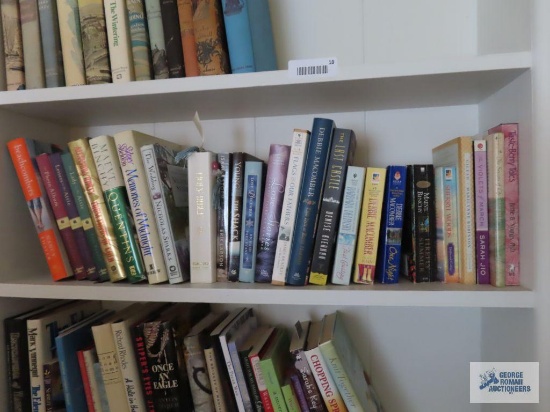 Variety of books including The Lady in the Attic, Letters in the Attic, Beachcombers, Love Stories