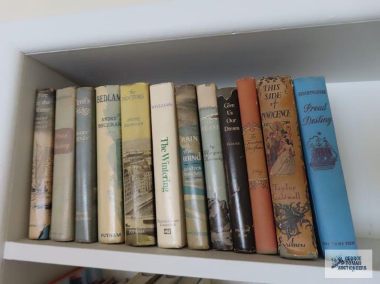 Variety of books including Fire in the Water, The Doctors, Rain on the Wind, The Wintering, Give Us