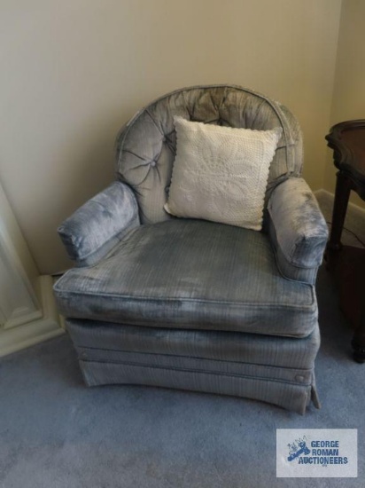 Pair of blue tufted back swivel platform chairs