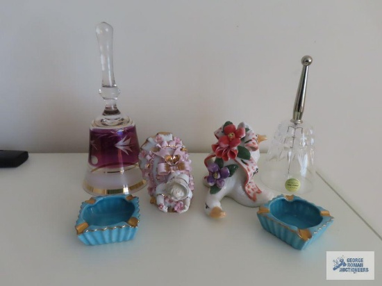 Princess House crystal bell. Two small ceramic ashtrays. Ceramic girl and goose figurines. Other