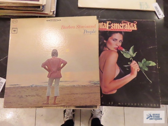 Barbra Streisand, Santa Esmeralda, and Cher records.