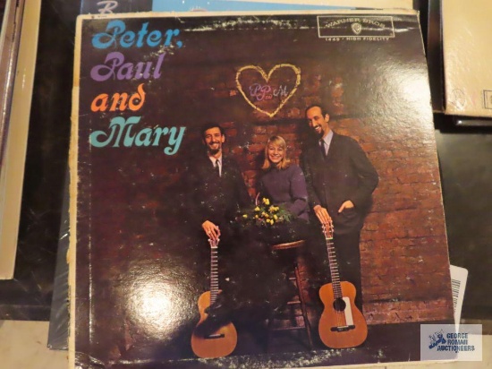 Variety of records, including History, America's Greatest Hits, Peter Paul and Mary, Joe Cocker, The