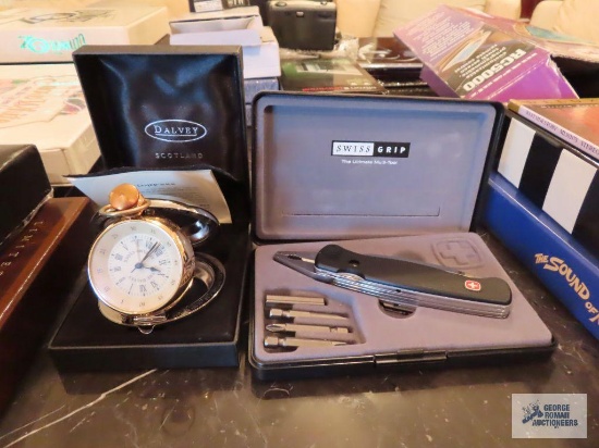 Swiss Grip the ultimate multi-tool and Dalvey Scotland St. Elmo clock.