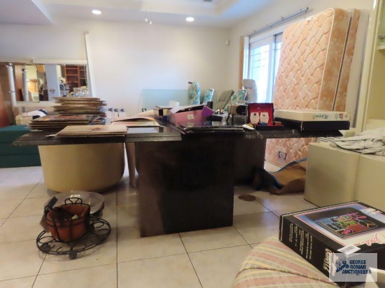 Black marble table. Heavy. Approximately 6' x 42". in basement.