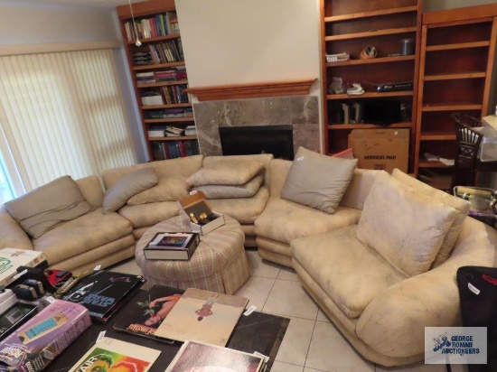 Dansen Contemporary five piece sectional sofa includes round ottoman