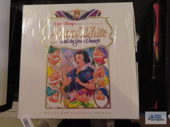 Walt Disney's Snow White and the Seven Dwarfs deluxe laser disc edition. Walt Disney's Aladdin
