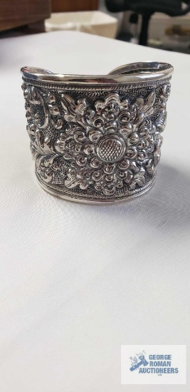 Bali Legacy Collection hollow sterling silver floral engraved bangle bracelet. (7.5", 42.6g).