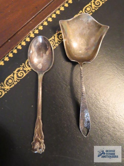 Small spoons, one marked Sweden, one marked sterling