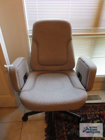 Upholstered executive chair.