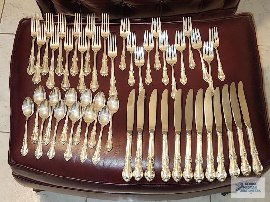 Sterling 12 Four piece place settings. Joan of Arc pattern. International Silver Company.