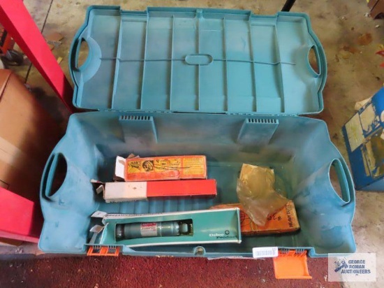 Assorted shocks and plastic tote