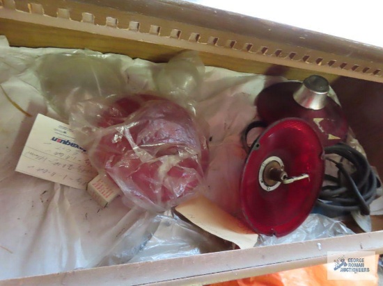 Variety of automotive parts in chest