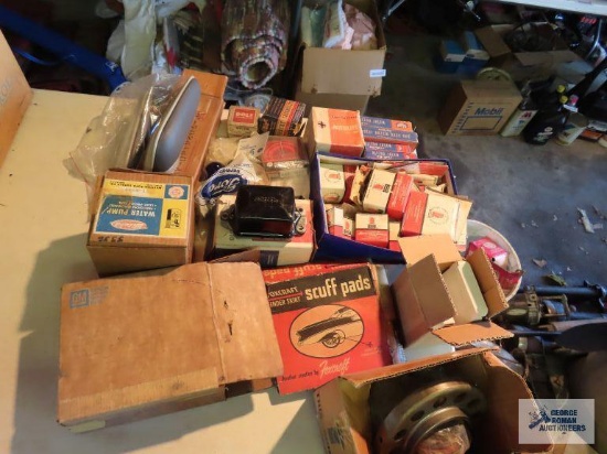 New Old Stock Tecumseh engine parts, Autolite parts, wizard water pump, and other vintage automotive