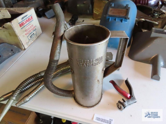 Vintage oil can, funnels, and can funnels