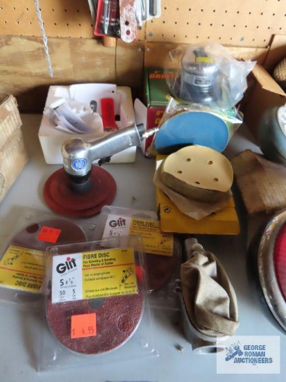 Pneumatic sanders with extra discs and spark plug cleaner