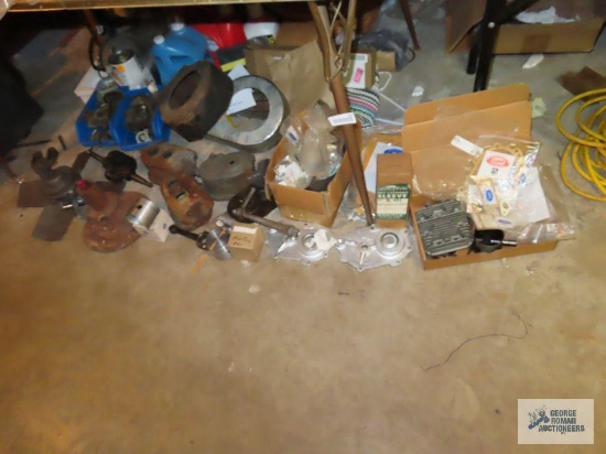 Variety of Cushman engine parts and other small engine parts
