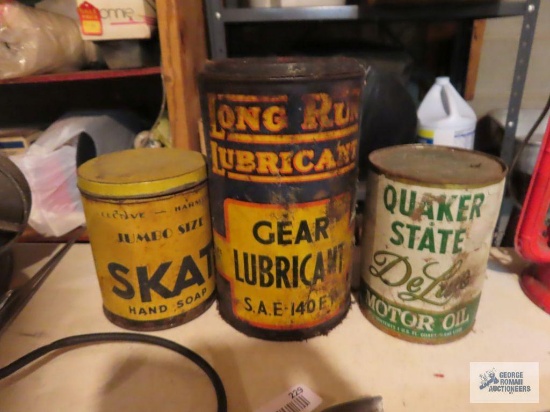 Vintage long run lubricant can, scat hand soap can and Quaker State sealed motor oil can