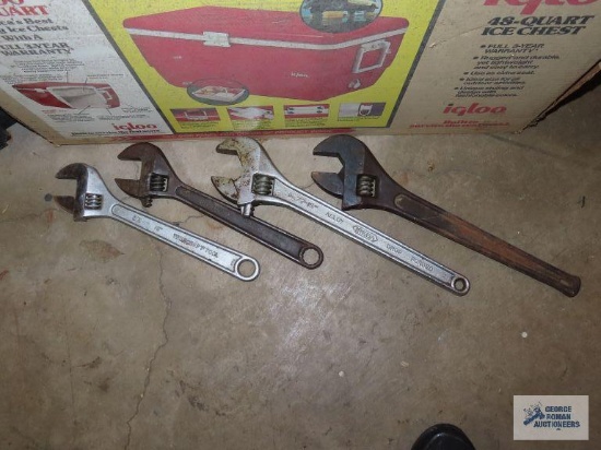 Four crescent wrenches