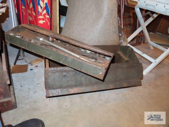 Assorted vintage sockets, 1/2 inch breaker bar, and metal tool box
