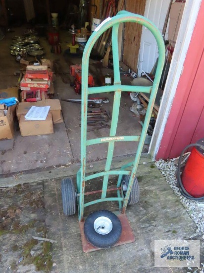 Dolly with pneumatic wheels and extra wheel. Tires will need to be inflated.