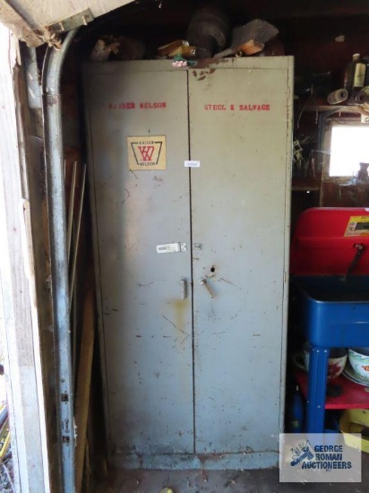 Metal cabinet with assorted contents