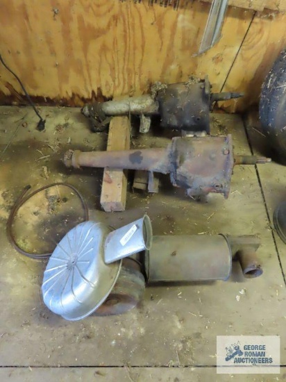 Two antique or vintage transmissions and other automotive parts