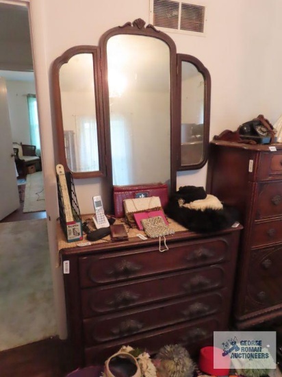 Antique oak dresser with acorn and leaf drawer handles. On first floor.