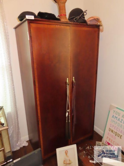 Antique mahogany armoire. on first floor.