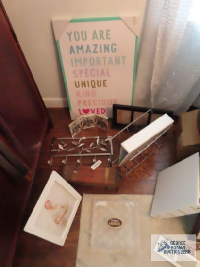 You are amazing wall hanging, wooden jewelry box, assorted photo frames and wall mounted metal coat
