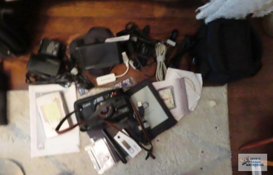 Garmin gps, Canon 35 mm camera, portable hard drive and Kindle
