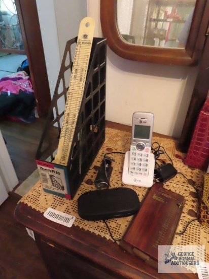 Tech file, polarize clip-on sunglasses with case, AT&T telephone