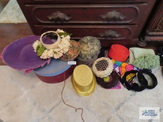 Variety of vintage and antique hats and scarves