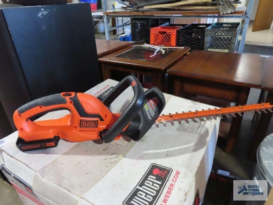 Black & Decker 20 volt hedge trimmers with one battery. No charger included
