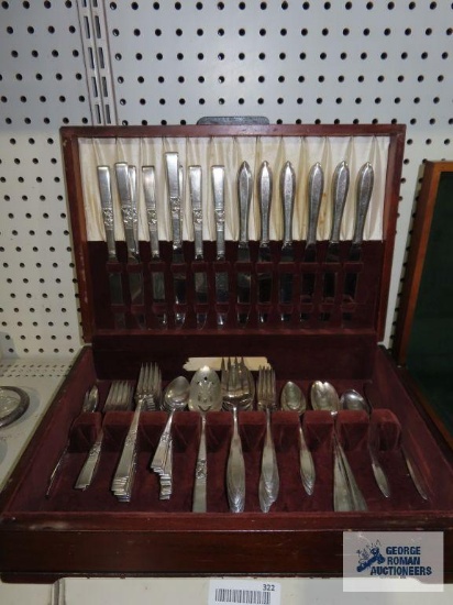 Various stainless steel flatware with case