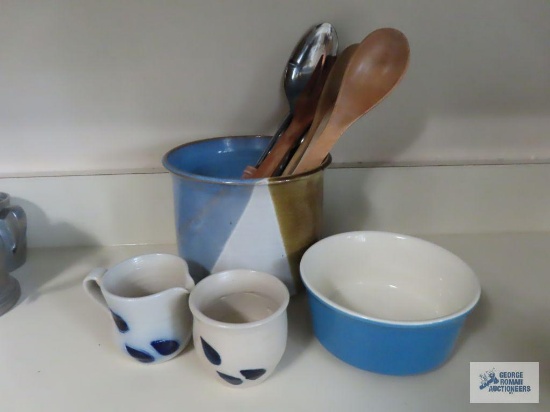 Williamsburg pottery creamer and sugar, wooden spoons and metal spoon, and signed clay planter