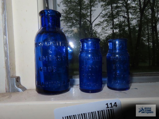 Bromo seltzer bottle marked 131 on the bottom and two smaller Bromo seltzer bottles marked with a