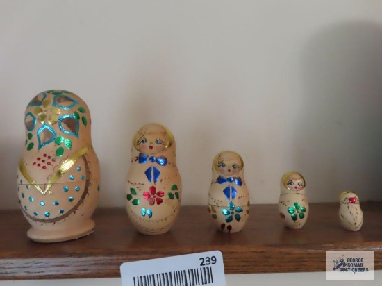 unmarked, five piece wooden nesting dolls
