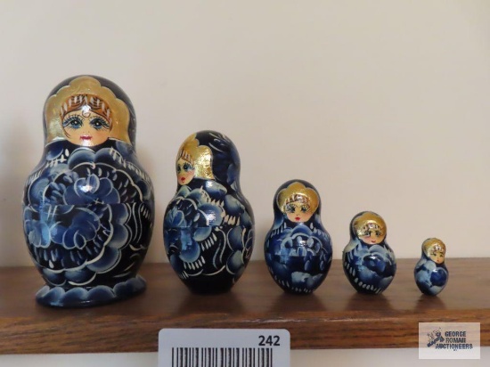 Five piece blue girl nesting doll set