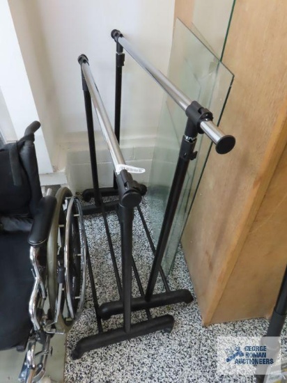 Two adjustable clothing racks